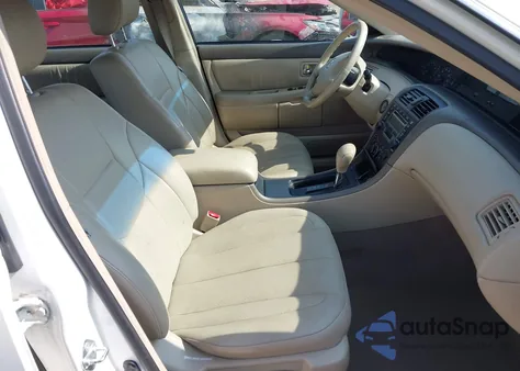 2004 Toyota Avalon Xl z USA, uszkodzony, nr VIN 4T1BF28B04U373929